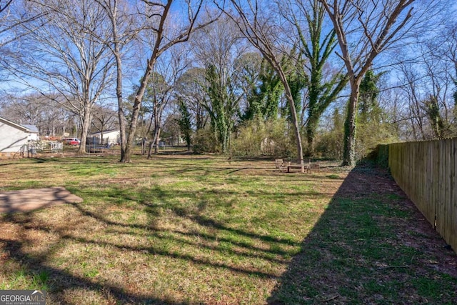 view of yard with fence