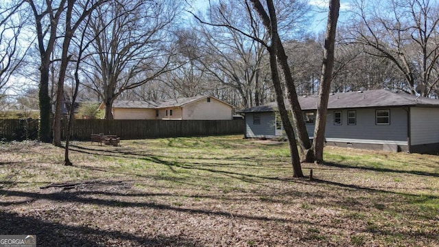 view of yard with fence