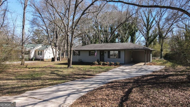 ranch-style house with driveway, a front lawn, and an attached carport