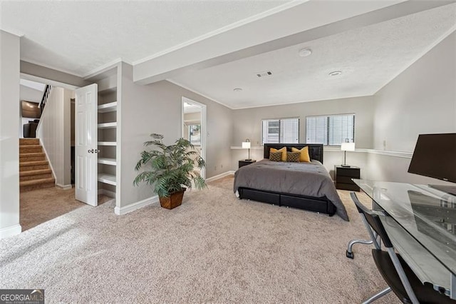 bedroom featuring light carpet, ornamental molding, multiple windows, and baseboards