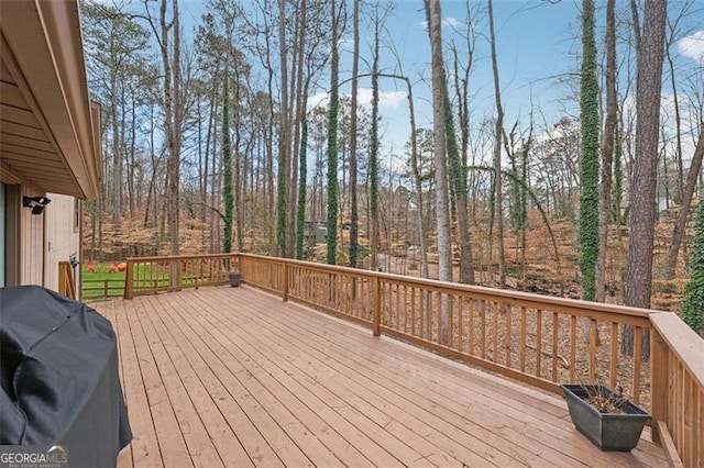 wooden deck with grilling area