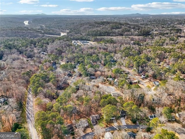 bird's eye view with a view of trees