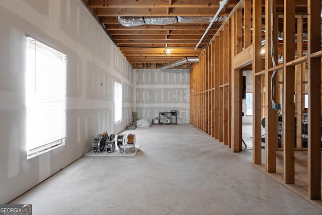 basement featuring a garage and a wealth of natural light