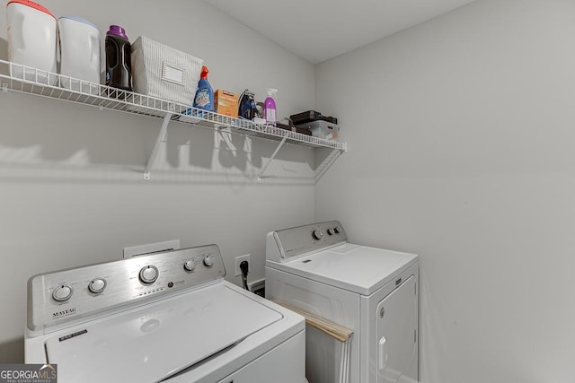 laundry area featuring laundry area and independent washer and dryer