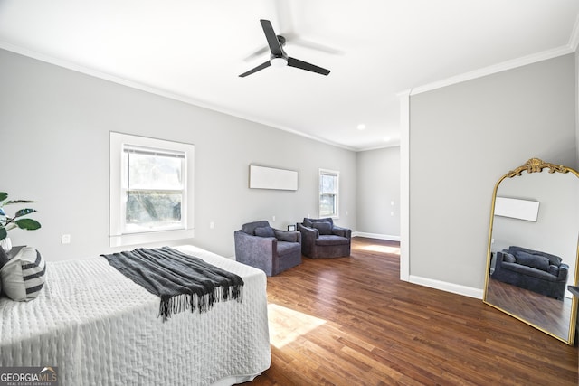 bedroom with a ceiling fan, dark wood finished floors, crown molding, and baseboards