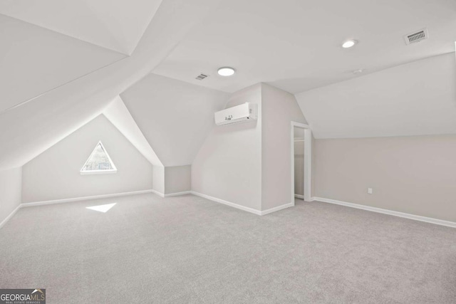 bonus room with baseboards, visible vents, an AC wall unit, and light colored carpet