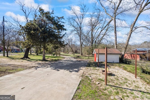 view of road featuring driveway