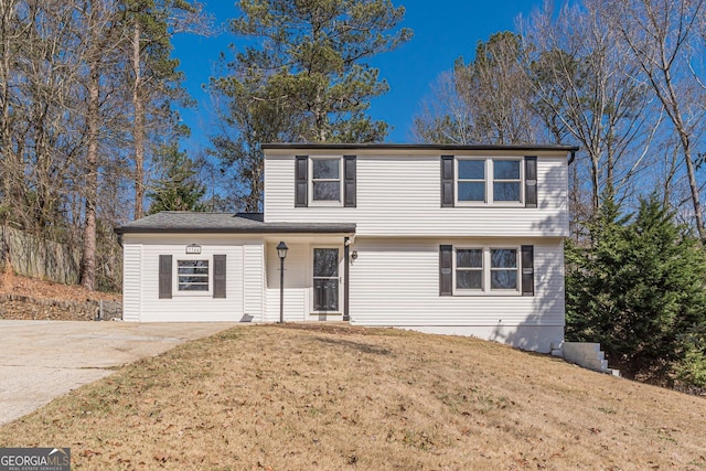 view of front of house with a front lawn