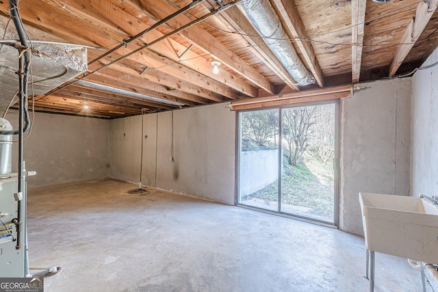 basement featuring a sink