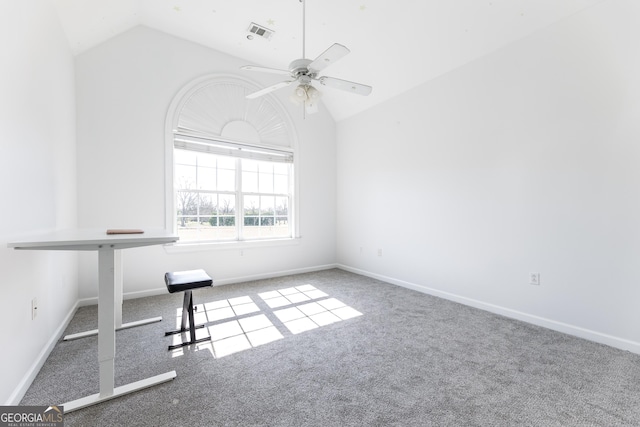 spare room featuring visible vents, baseboards, lofted ceiling, ceiling fan, and carpet floors