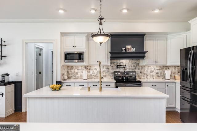 kitchen featuring white cabinets, hanging light fixtures, appliances with stainless steel finishes, light countertops, and custom range hood