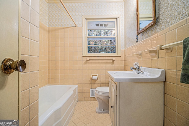 full bath with toilet, a wainscoted wall, vanity, visible vents, and wallpapered walls