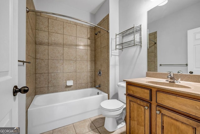 full bath featuring tile patterned flooring, shower / tub combination, vanity, and toilet