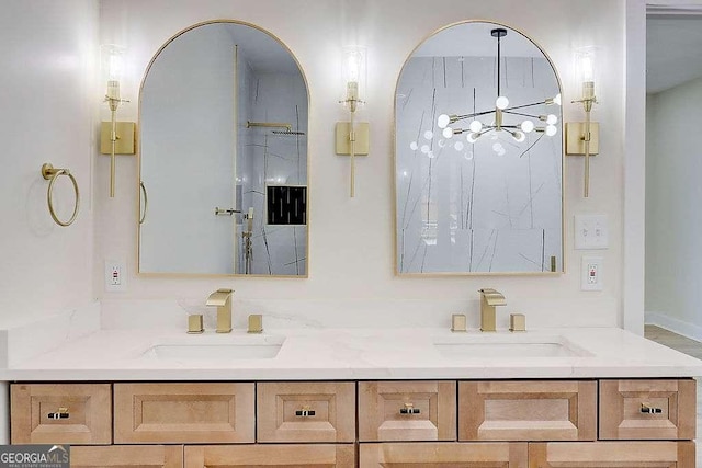 bathroom featuring double vanity and a sink