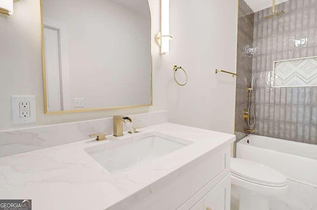 full bathroom featuring toilet, shower / bathing tub combination, and vanity