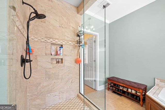 bathroom featuring a stall shower, tile patterned flooring, ornamental molding, and a bath