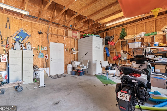 garage featuring a workshop area