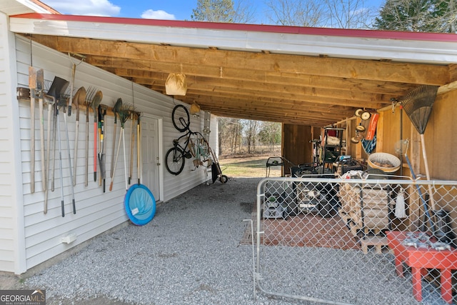 exterior space featuring an attached carport