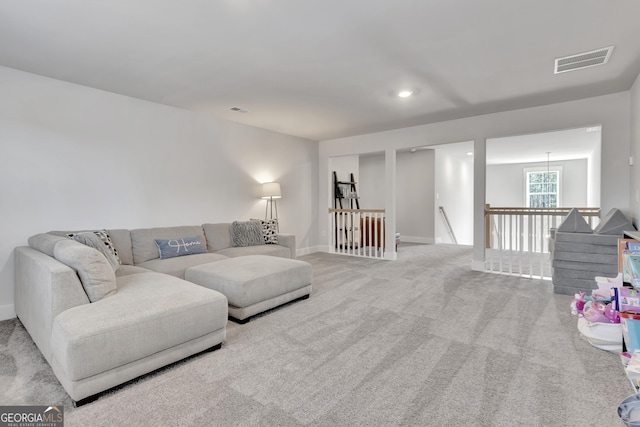 living room with light carpet, baseboards, visible vents, and recessed lighting