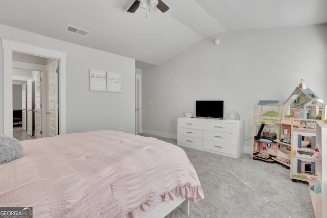 bedroom featuring lofted ceiling, light colored carpet, visible vents, a ceiling fan, and baseboards