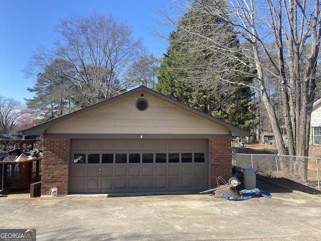 garage featuring fence