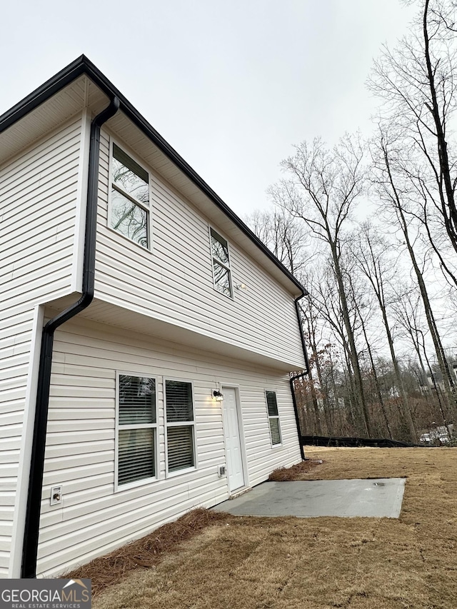 rear view of house with a patio area