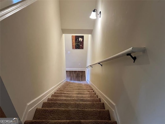 staircase with baseboards