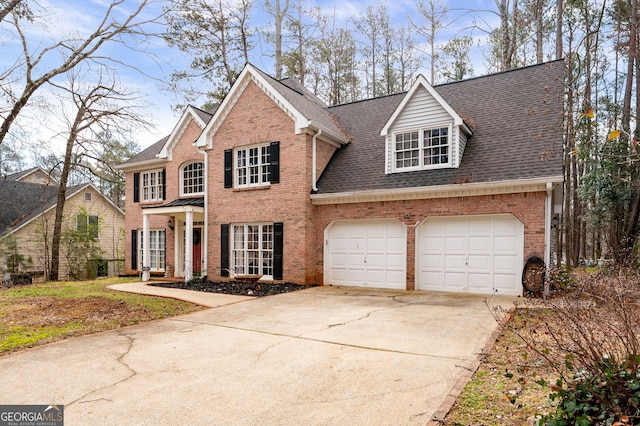 view of front facade featuring concrete driveway, brick siding, roof with shingles, and an attached garage