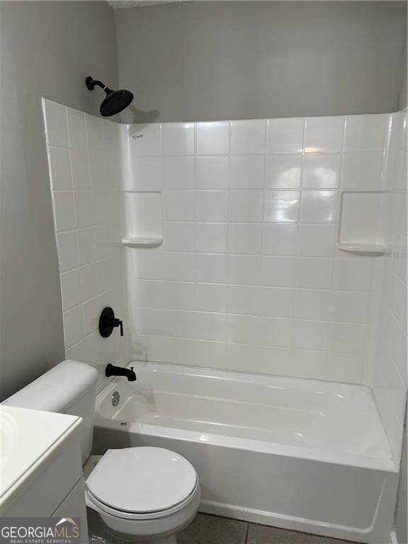 bathroom with toilet, tile patterned flooring, shower / washtub combination, and vanity