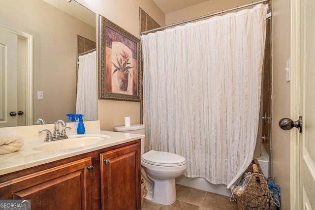 bathroom featuring tile patterned flooring, shower / tub combo with curtain, vanity, and toilet