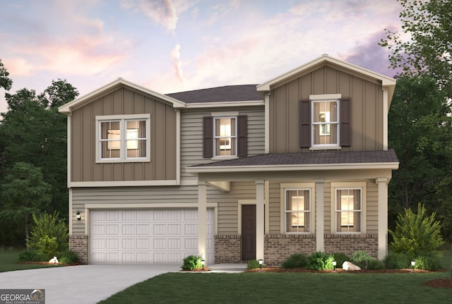 view of front of property with board and batten siding, concrete driveway, brick siding, and a garage