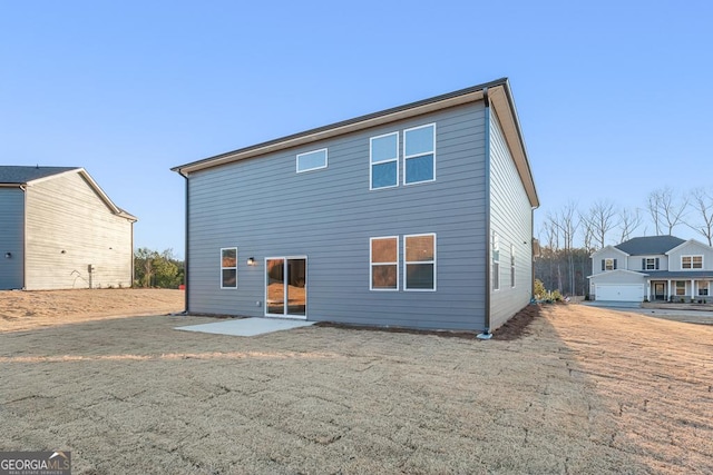 back of house featuring a patio