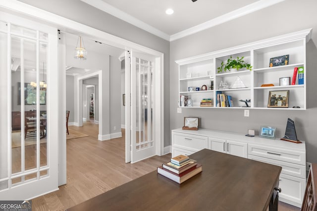 office with recessed lighting, baseboards, crown molding, and light wood finished floors