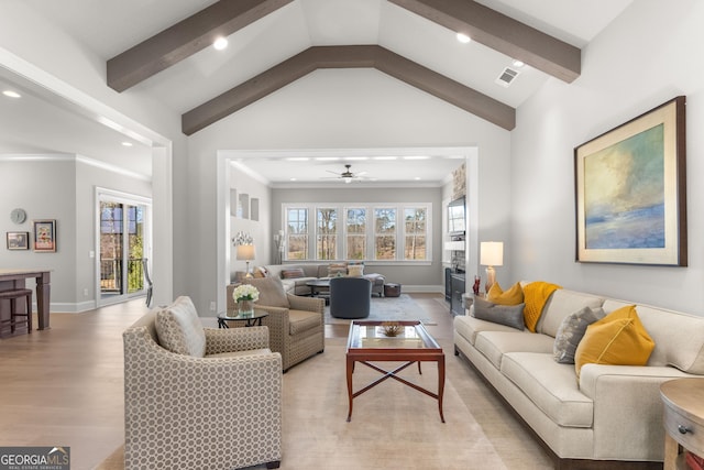 living area featuring lofted ceiling with beams, recessed lighting, visible vents, baseboards, and light wood-type flooring