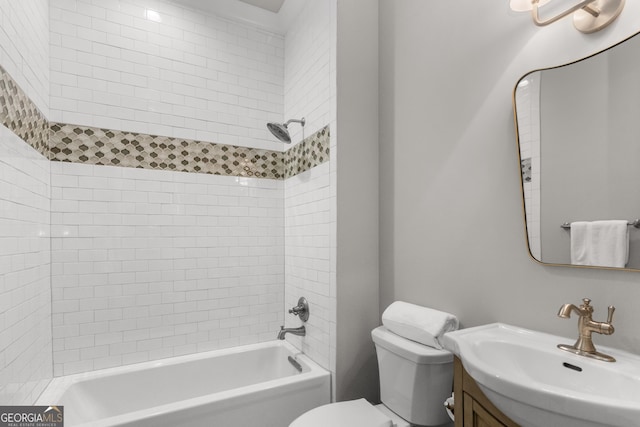 bathroom with  shower combination, vanity, and toilet