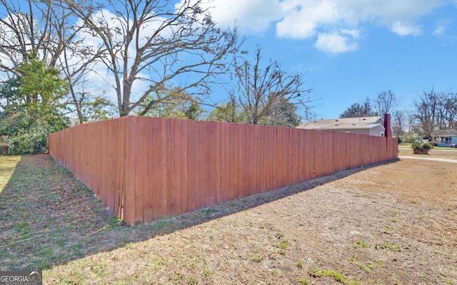 view of yard with fence