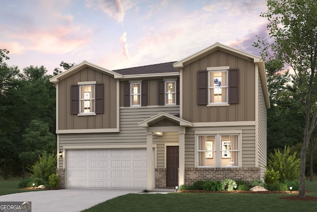 view of front of house featuring a garage, concrete driveway, brick siding, and board and batten siding