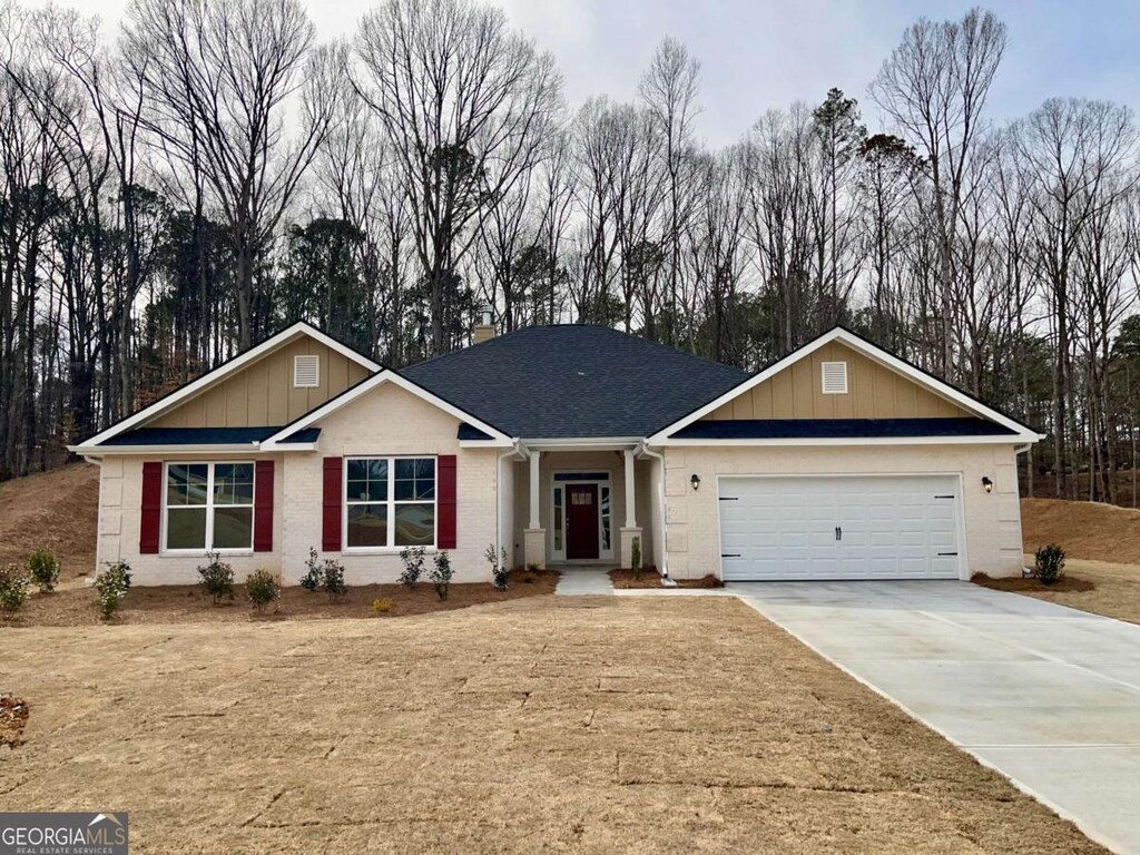 5311 Tuscany Dr Lot 98Plapprox, Sqft, Douglasville, GA 30135 - ranch-style house featuring a garage, concrete driveway, brick siding, and roof with shingles