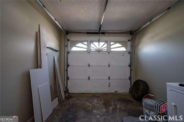 garage featuring washer / dryer