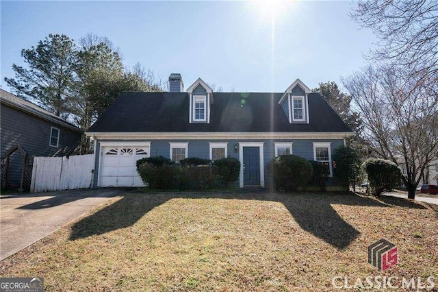 cape cod house featuring a garage, fence, driveway, a front lawn, and a chimney