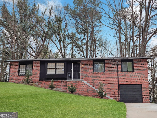 ranch-style house featuring a garage, driveway, a front lawn, and brick siding