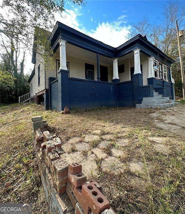 view of home's exterior featuring brick siding