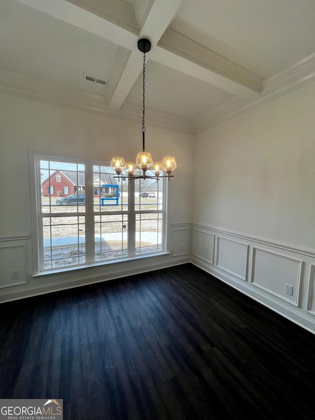 unfurnished dining area featuring an inviting chandelier, plenty of natural light, visible vents, and beamed ceiling