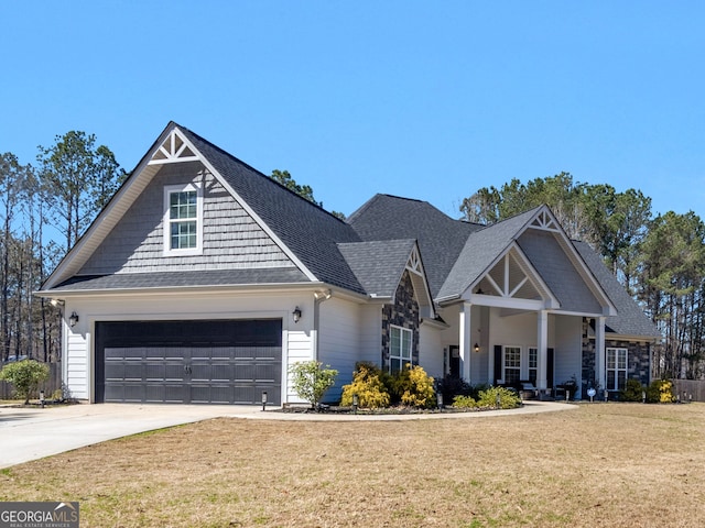 view of front of home featuring driveway, a front lawn, and roof with shingles