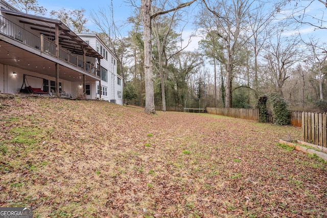 view of yard featuring fence