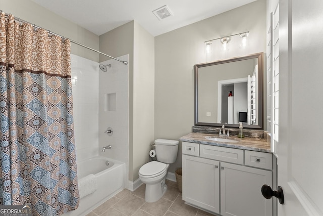 full bath with visible vents, toilet, shower / bath combo with shower curtain, vanity, and tile patterned flooring