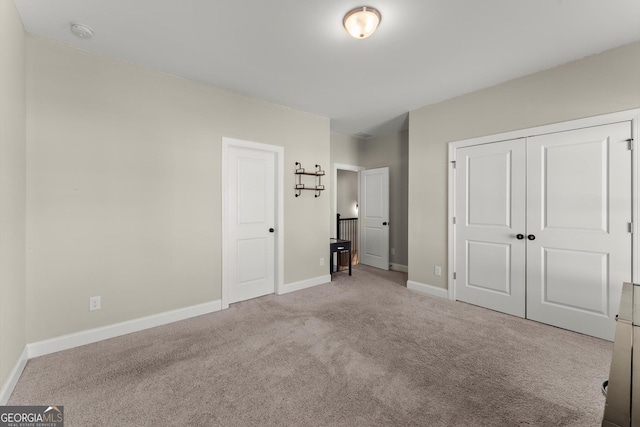 2903 Eva Clb, Acworth, GA 30101 - unfurnished bedroom featuring carpet and a closet