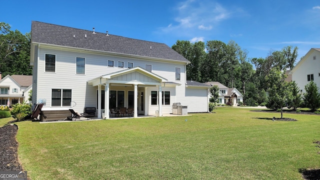 2903 Eva Clb, Acworth, GA 30101 - rear view of house with a patio area, a yard, and a shingled roof