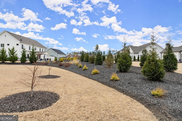 view of yard with a residential view