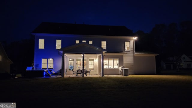 2903 Eva Clb, Acworth, GA 30101 - back of house at night with a patio area